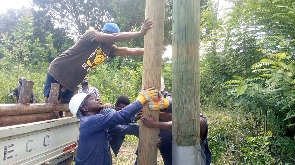 ECG offcials mounting a pole