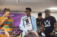 Kofi Kinaata (in blue attire)