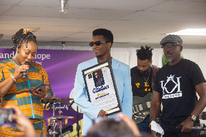 Kofi Kinaata (in blue attire)