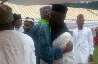 Alhaj Mustapha Oti Boateng in a hug with the Ameer & Missionary In Charge of Ghana at the ceremony
