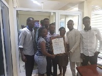 The TESCON executives presenting the citation to Dominic Eduah