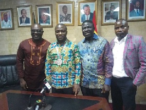 President of GAF, Charles Osei Assibey in a photo with the Mayor and two others at the meeting