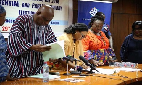 Electoral commissioners sorting out documents of political parties