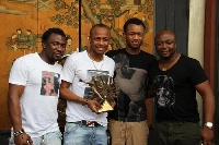 Abedi Pele with his sons