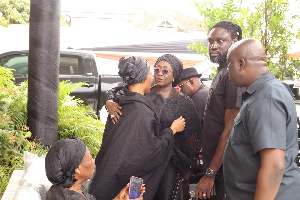 The minister (3rd from left) made this heartfelt appeal during a visit to the family home