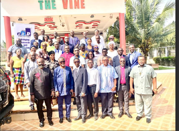 Participants of the dialogue in a group photo