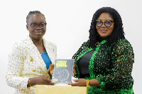 Gender Minister, Dr Agnes Naa Momo Lartey (R) pictured with Hannah Osei (L) during the meeting