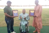 Botsyo Nkegbe with members of Association of Sports for the Disabled (ASFOD)