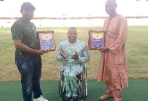 Botsyo Nkegbe with members of Association of Sports for the Disabled (ASFOD)
