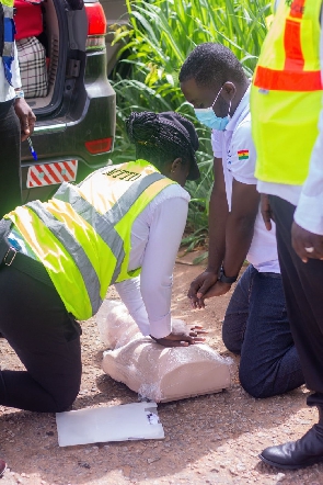 An instructor taking participants through CPR lessons