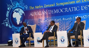 Vice president Amissah-Arthur (left) emphasizing a point at the symposium in Kigali