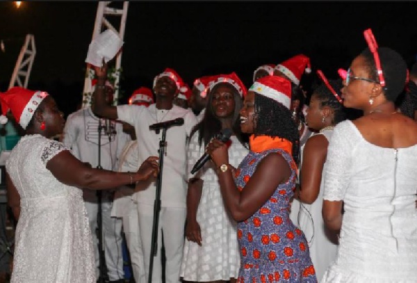 Staff gathered to sing praise to God in honour of the birth of Christ