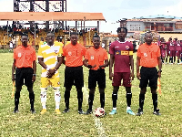 A picture of captains of the two sides with match officials