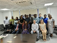 Participants in a group photo after the meeting in Accra