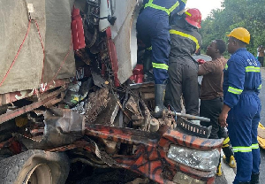 Some first responders seen here salvaging the broken down trailer