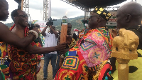 Togbe Tepreh Hodo IV (left) handing over a perpetual flame to Togbega Kadzi Zogah II (right)