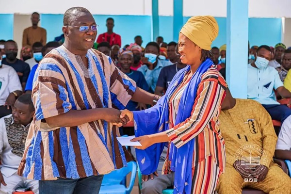 Dr. Mohammed Amin Adam with beneficiary