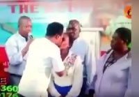 Prophet Nana Poku kissing a female church member