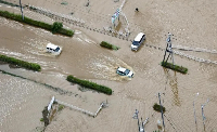 Cars were left abandoned in the streets of Oamishirasato, in Chiba