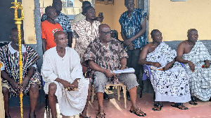 Daasebre Adusei Peasah IV, Akyem Tafo Hene and his elders addressing the people