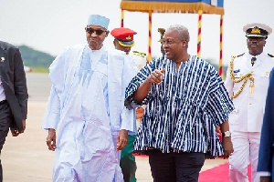 R-L: John Mahama and Muhammadu Buhari