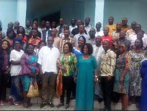 Hon. Otiko Afisa Djaba in a group picture with participants of the media dialogue