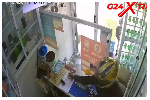 Watch: CCTV captures moment a suspected robber raids a mobile phone shop