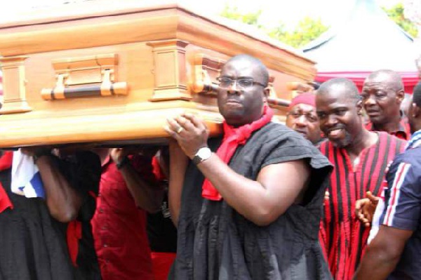 National Youth Organizer of the NPP, Sammy Awuku and others carrying a coffin