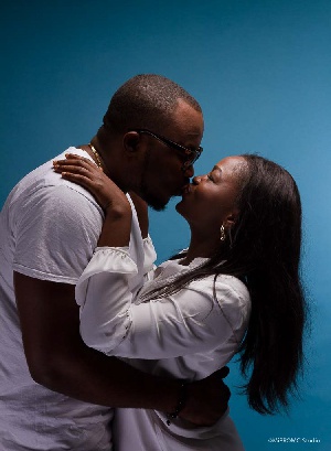 DKB kissing his 'mystery' lady