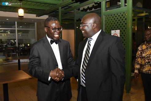 Dr. Mahamudu Bawumia shaking co-editor, Prof. Kwaku Appiah-Adu