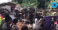 The driver was able to veer off the road but the truck overturned and crashed into the shops