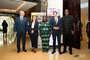 GIPC boss in a photograph with the German delegation