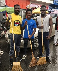 Abraham Attah (M) joined voulunteers to clean up the streets of Takoradi