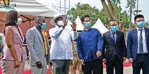 President Museveni (2nd right) with his entourage