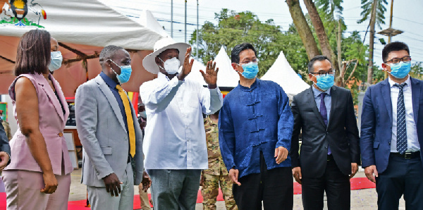 President Museveni (2nd right) with his entourage