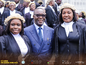 Patience Baffoe-Bonnie (R) was among public officials who took the oath of office at a ceremony