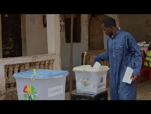 A man casts his vote during the presidential and legislative elections, in Bissau