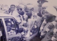 The late B.K. Edusei (in car) receiving a trophy from then Kotoko captain Ibrahim Sunday