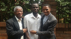 Charles Antwi (middle) flanked by his lawyers