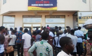 DKM customers gather in front of the micro finance office.