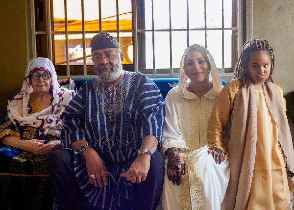 Alhaji Said Sinare (2nd L) with his mother (L) and his family