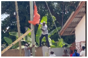A resident rescuing the electrician A resident rescuing the electrician