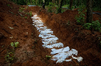 Bodies of victims at Devghat mass burial site in Chitwan, Nepal