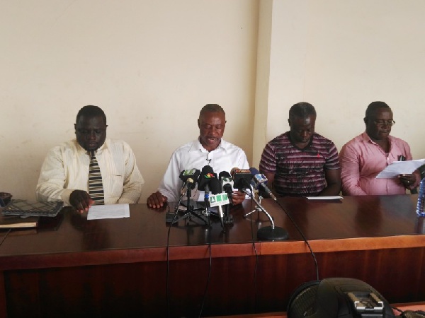 Chairman of the Union, George Nyauno [Middle] addressing a news conference