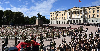 People gathered outside the royal palace in Oslo as the procession started