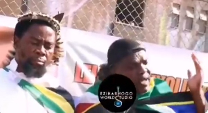 Screenshot from video of activist making a call to African governments to evacuate nationals