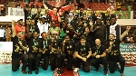Malkia Strikers players celebrate with the trophy after beating Egypt