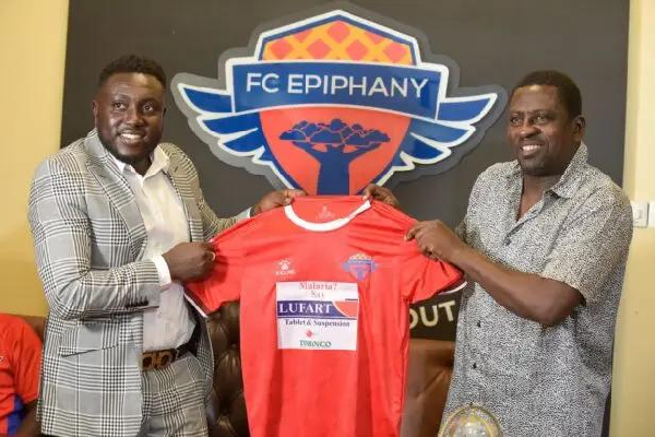 Joe Nana Adarkwa (R) during his unveiling