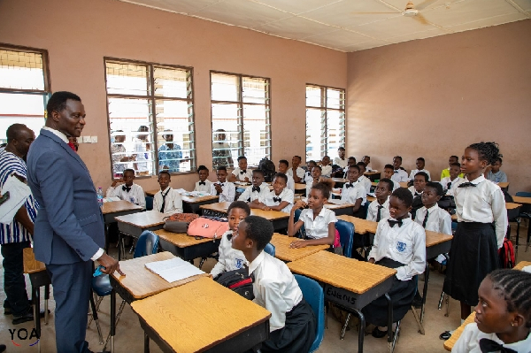 Dr Yaw Osei Adutwum, Education Minister addressing students of the model school