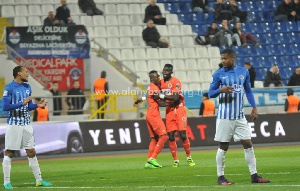 Isaac Sackey celebrating with a teammate